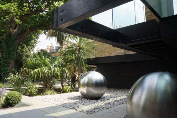 Hard landscaping garden design, cantilevered extension, beautiful gardens
