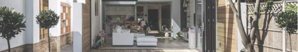 Build Administration - view of the garden into an open living room - create a light and open space in the city with Architecture:WK.