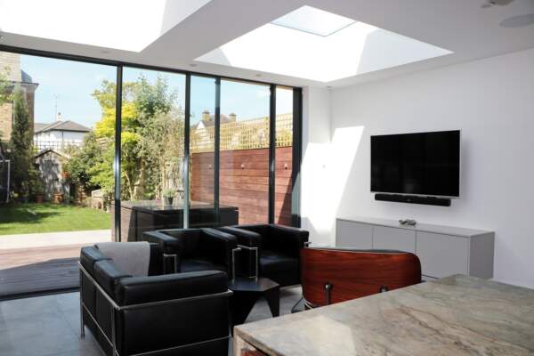 Residential extension with glass skylights in the M-House in Waldegrave Gardens, London