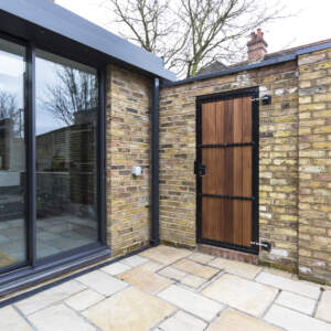 field lane brick wall garden gate